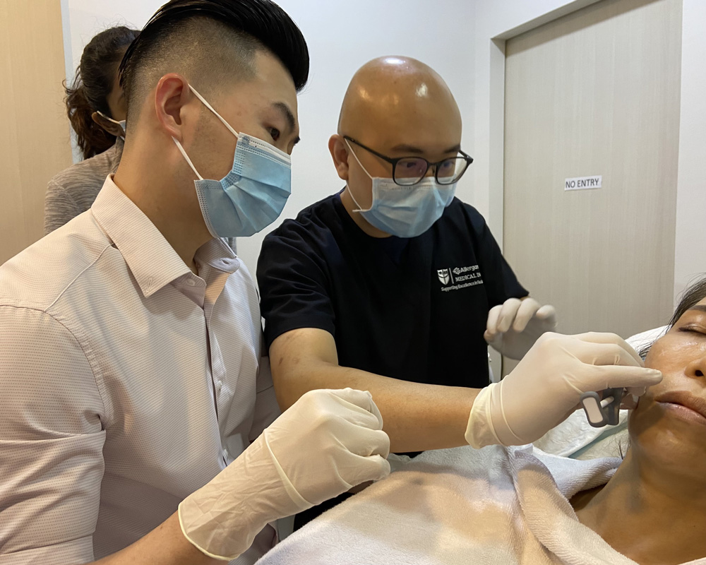 Dr-Heng-showing-injection-technique-min